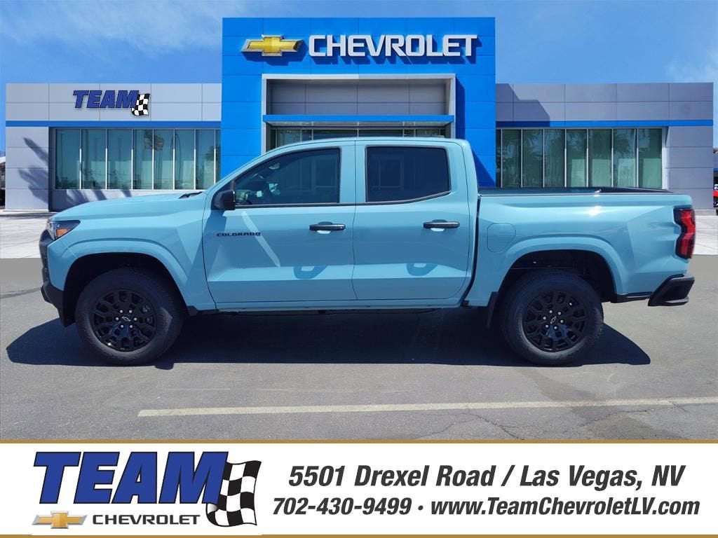 2026 Chevrolet Colorado WT in Snowdrift Metallic — front three-quarter view