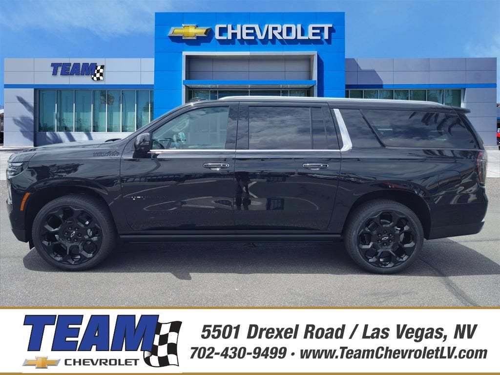 2026 Chevrolet Suburban High Country in Black — front three-quarter view