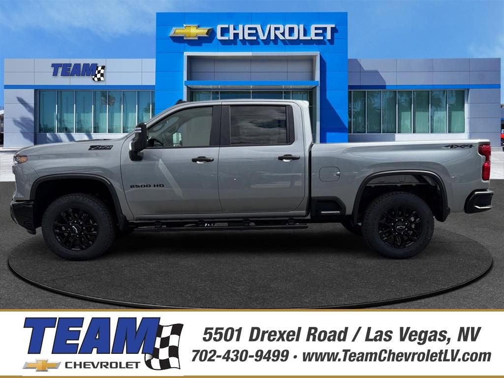 2026 Chevrolet Silverado 2500 HD Custom in Sterling Gray Metallic — front three-quarter view