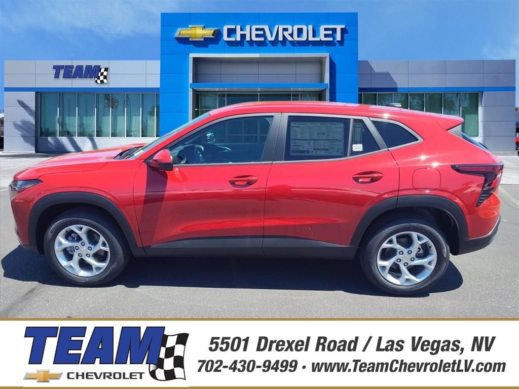 2026 Chevrolet Trax LS in Apex Red — front three-quarter view